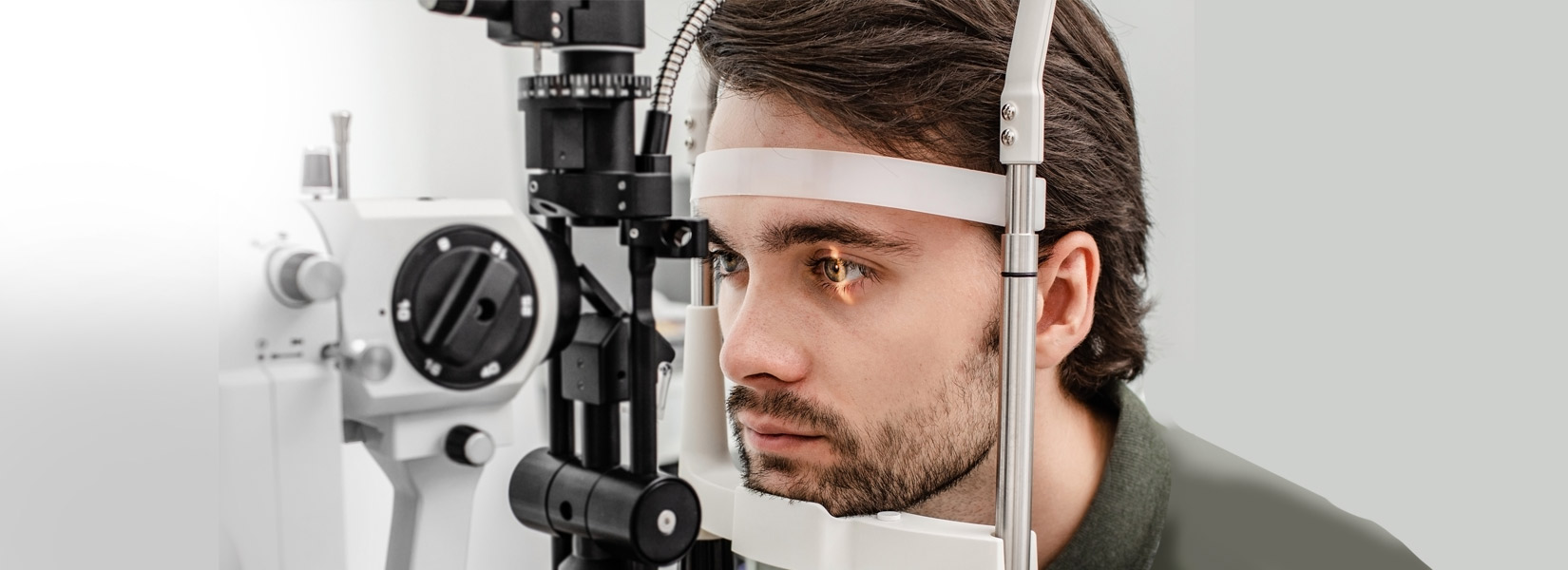 young man during eye exam in Plymouth